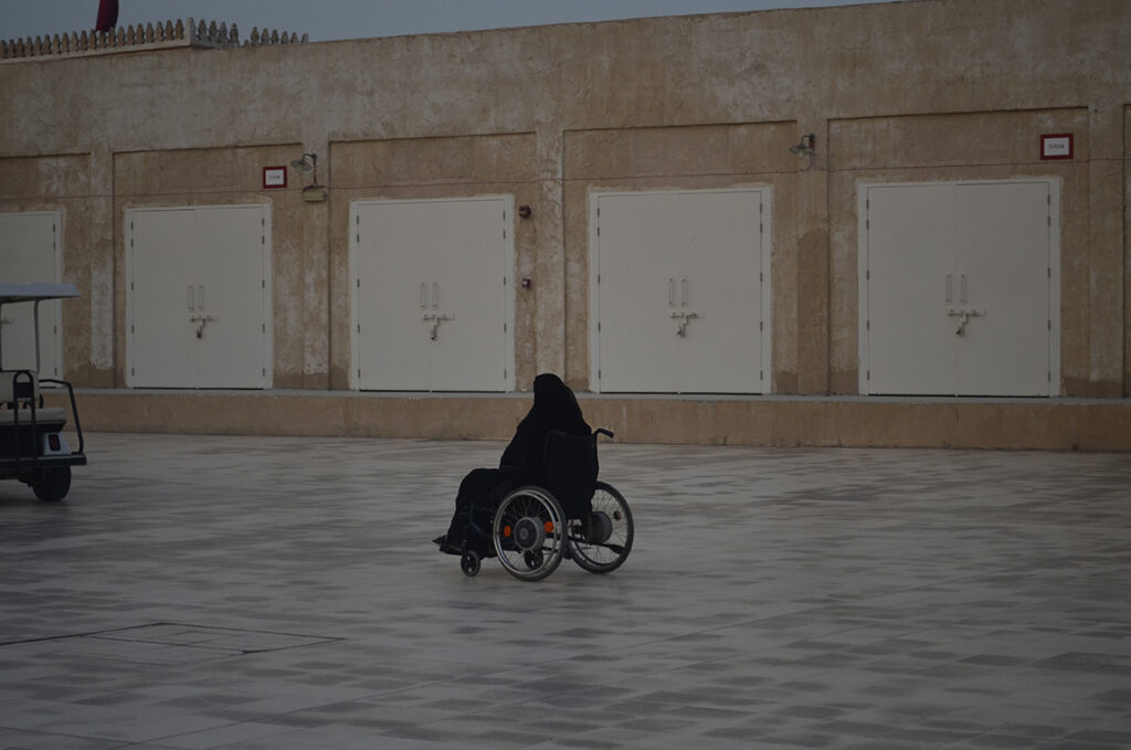 Lady in Wheal chair at Souq Al Wakra Qatar – Traditional Heritage Market DSC4455